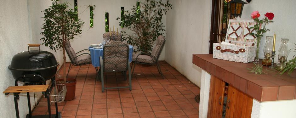 Outside dining area with weber braai