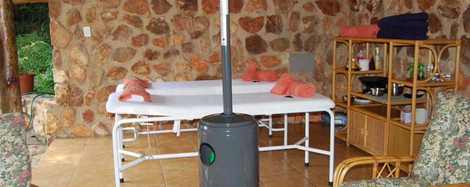 Massage beds under the thatch lapa