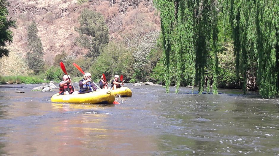 Rafting group on a calm stretch of river